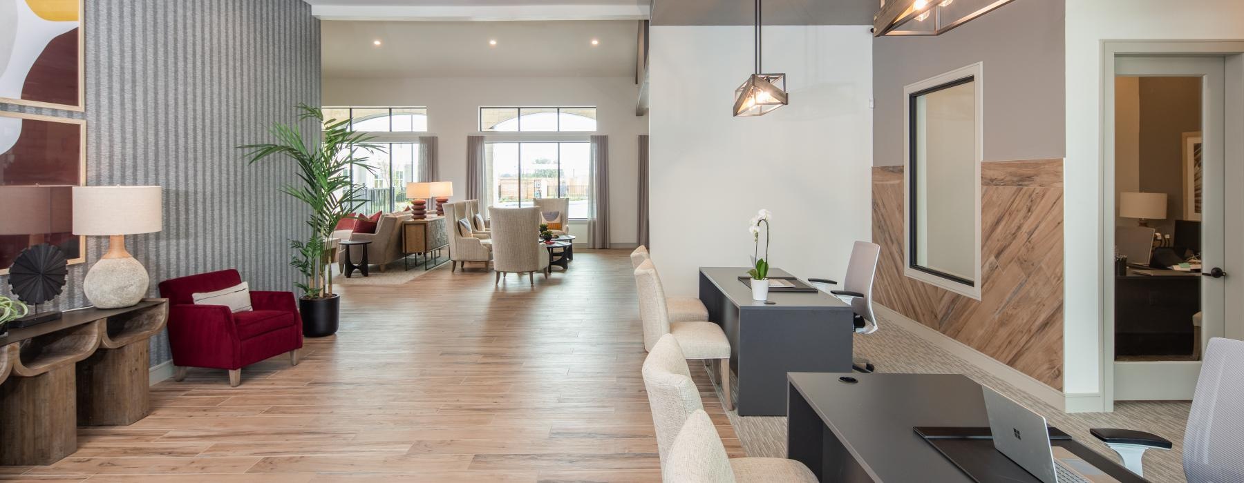 a large living room with a large glass wall