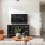 a living room with a tv and a fireplace